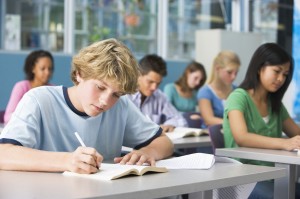 Schoolboy in high school class