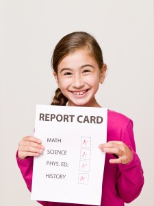 Happy Student with Good Report Card