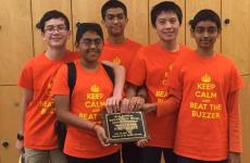 The T.H. Rogers team shows off their state championship placard. Image courtesy of HISD News Blog.
